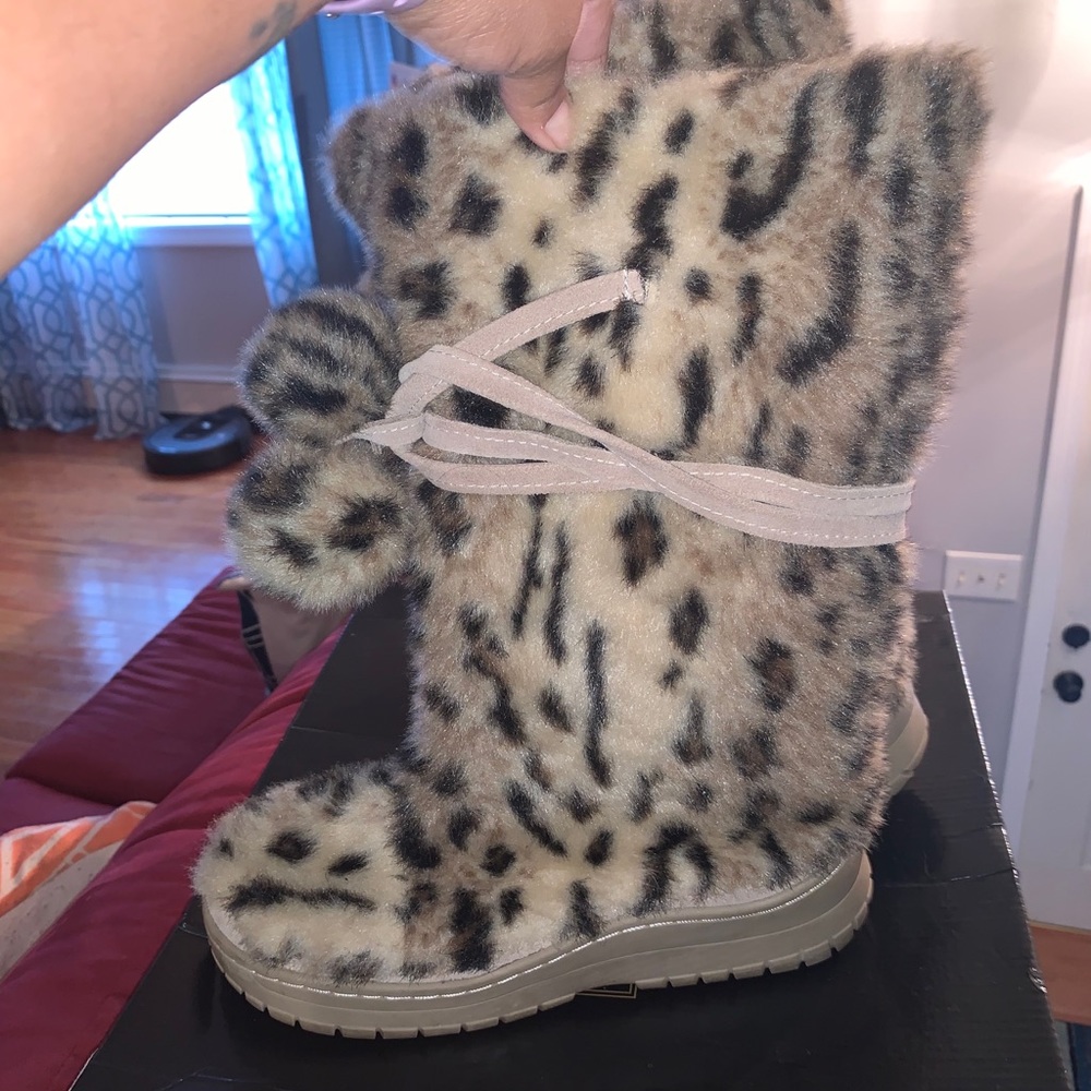 Victoria Secrets  faux fur Pom Pom boots.
